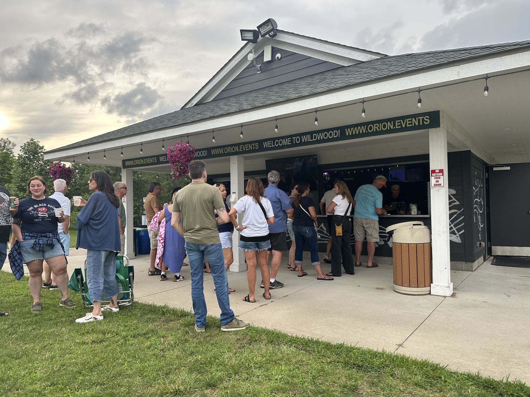 Guests lining up at the AMP bar windows before a show